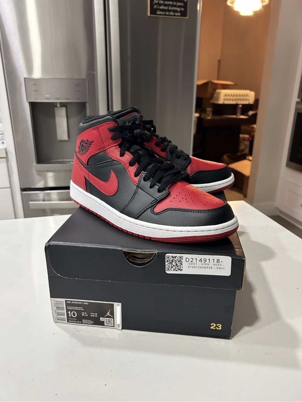 Nike Air Jordan 1 Mid Black and Red Sneakers